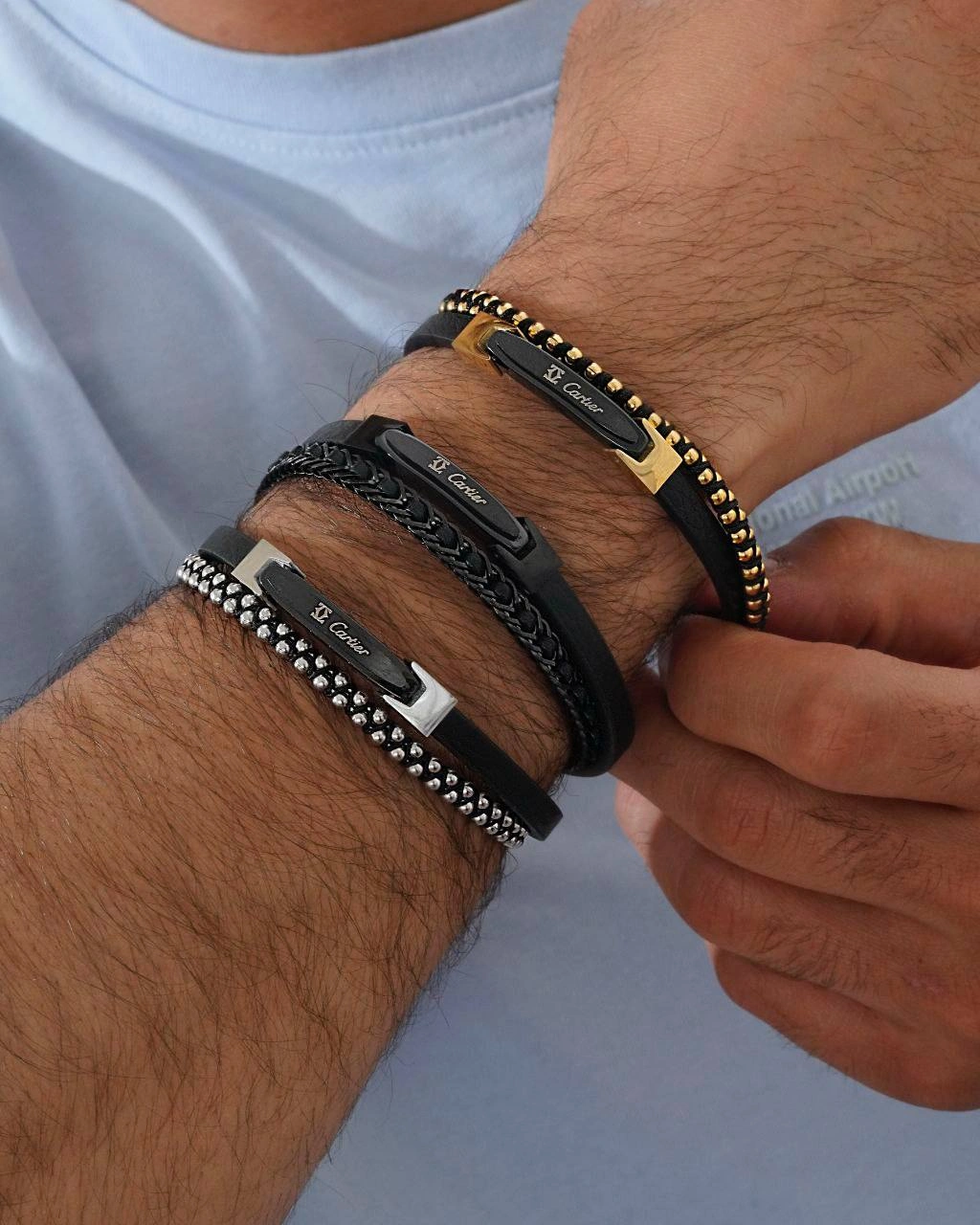 دستبند چرمی و استیل کارتیر | خرید دستبند مردانه شیک و لوکس